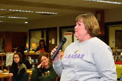 Mrs. Young with a microphone