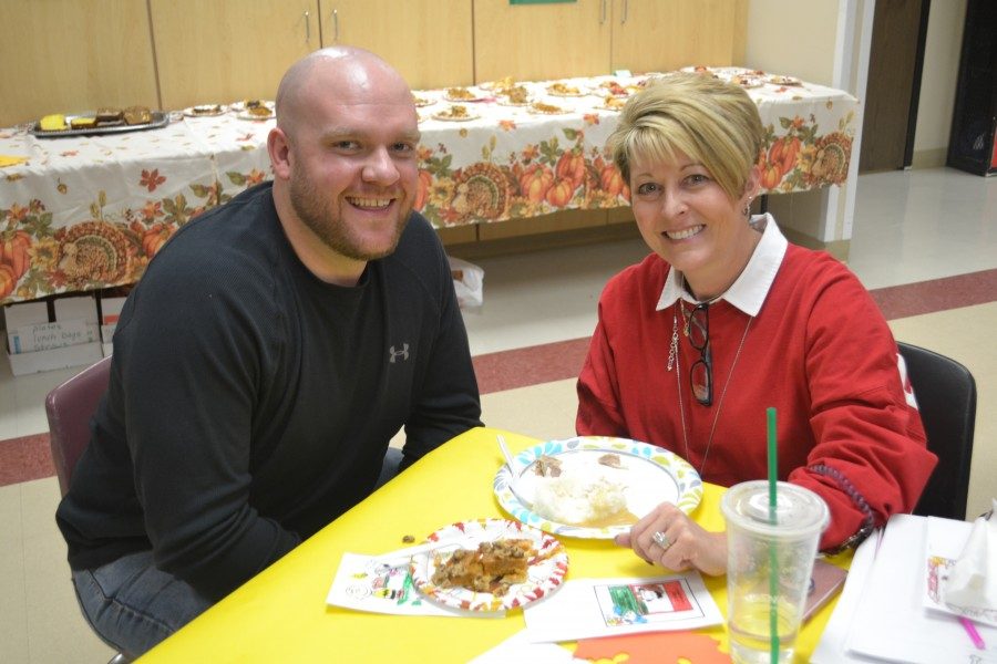 Something to be Thankful For: Ericka Swanson and  Ben Alman enjoy a meal during the ILC Thanksgiving celebration. 