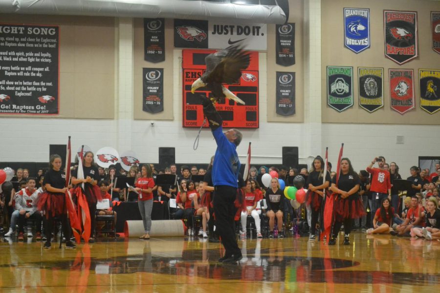 SYMBOLIC FIGURE: Free Spirit flaps her wigs at the most recent homecoming pep assembly. 