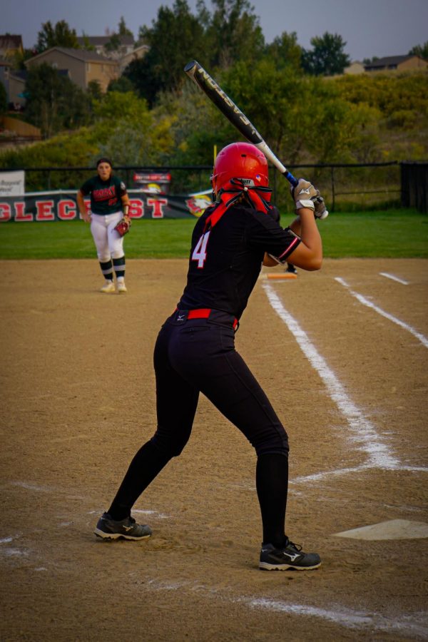 Jayden Paulsen (#4) in her batting stance ready for any pitch to come at her.