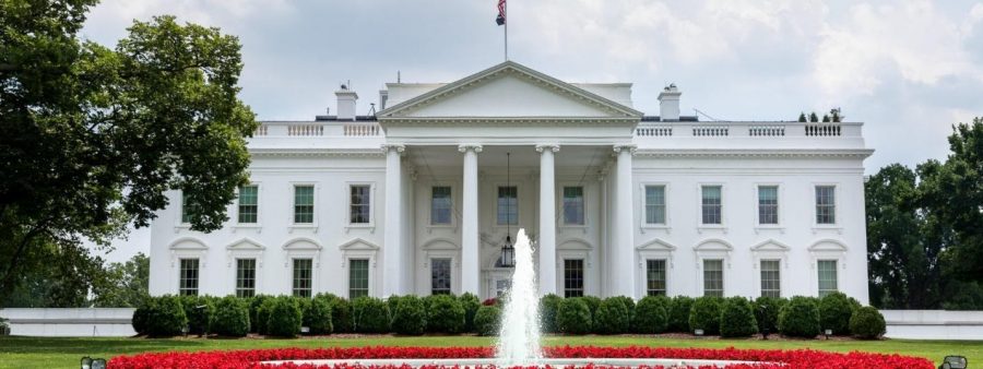 Image of the White House during the summer as seen from the North Lawn and Pennsylvania Avenue in Washington, D.C. Image Courtesy of the United States Government.