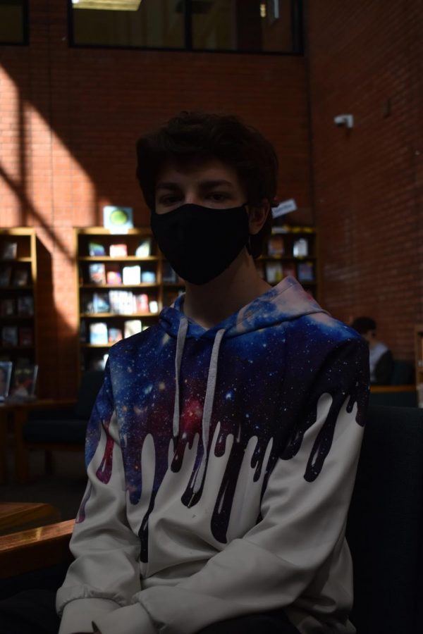 Ryder Waggoner, junior, chilling during 1st period in the library. (Mandalena Peou)