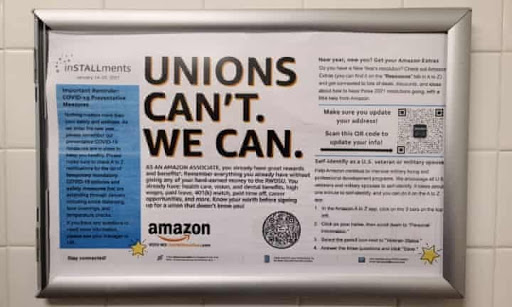 One of several anti-union posters that Amazon placed throughout the Bessemer plant (Credit: The Guardian).