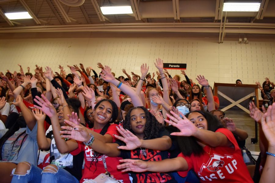 Showing the Raptor Spirit: Students in the bleachers participate in games that hype them up for the rally