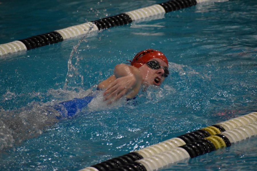 500 Free and 200 Back swimmer Kaylee Barnett competes at A-Leagues, breaking the surface for a breath on her next stroke in the 500 Free.