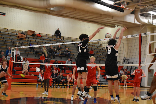 Middle Blocker Ikechukwu Onwuegbu and Outside Hitter Alex Ofpferman successfully blocks an attempt at a spike from the Raiders. (Crystal Li)