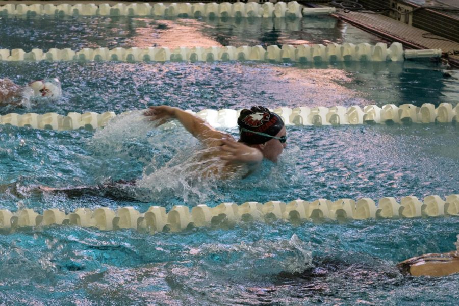 Fierro competes in her second event of the day, the 100 yard butterfly, placing 6th with only four seconds behind first place.