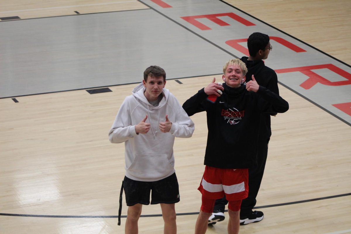 Juniors Jackson Shaw and Austin Wells preparing for their upcoming game.