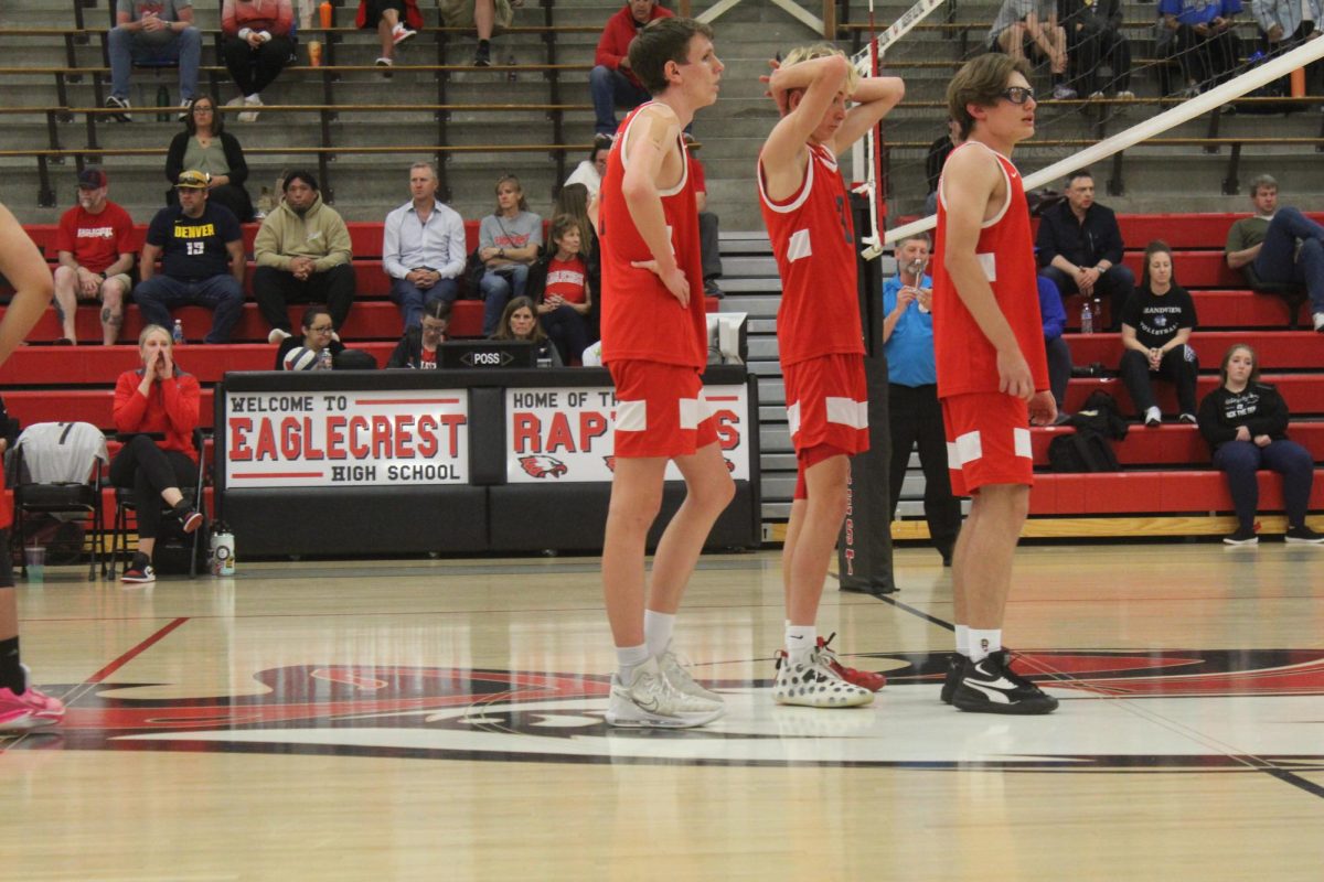 Juniors Jackson Shaw, Austin Wells, and Ethan Levakin are disappointed about a mishit, but try to regain their focus for the next point.
