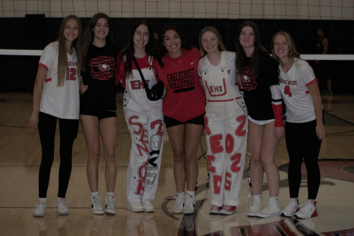 EHS volleyball pose before the Varsity scrimmage. 