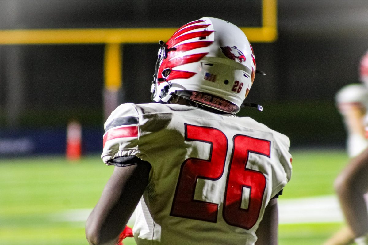 Senior Josh Wiley takes the field to cause havoc against Rangeview's defense. 