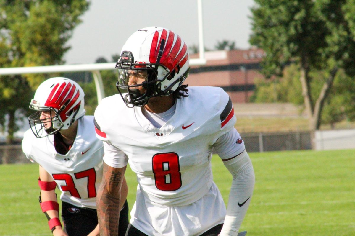 Senior DL T'Mario Walters and Sophomore Kicker Trey Patton line up for a trick play during the 2 point conversion. 