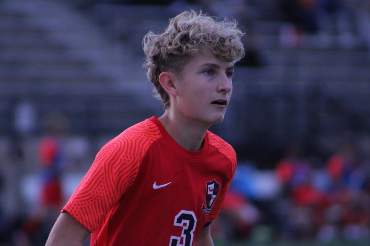 A close up of junior Drew Tullio focused on the game.