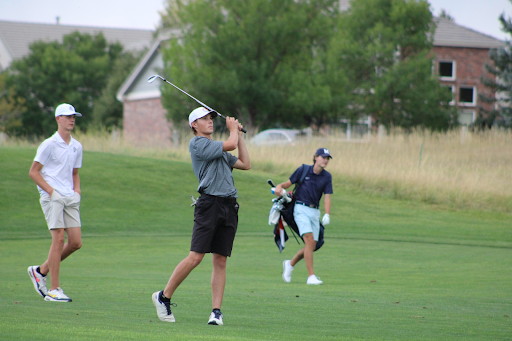 Greg White is teeing off at a recent match.  He is one of the most promising golf players in Eaglecrest, and has the drive to be the best in Colorado. 