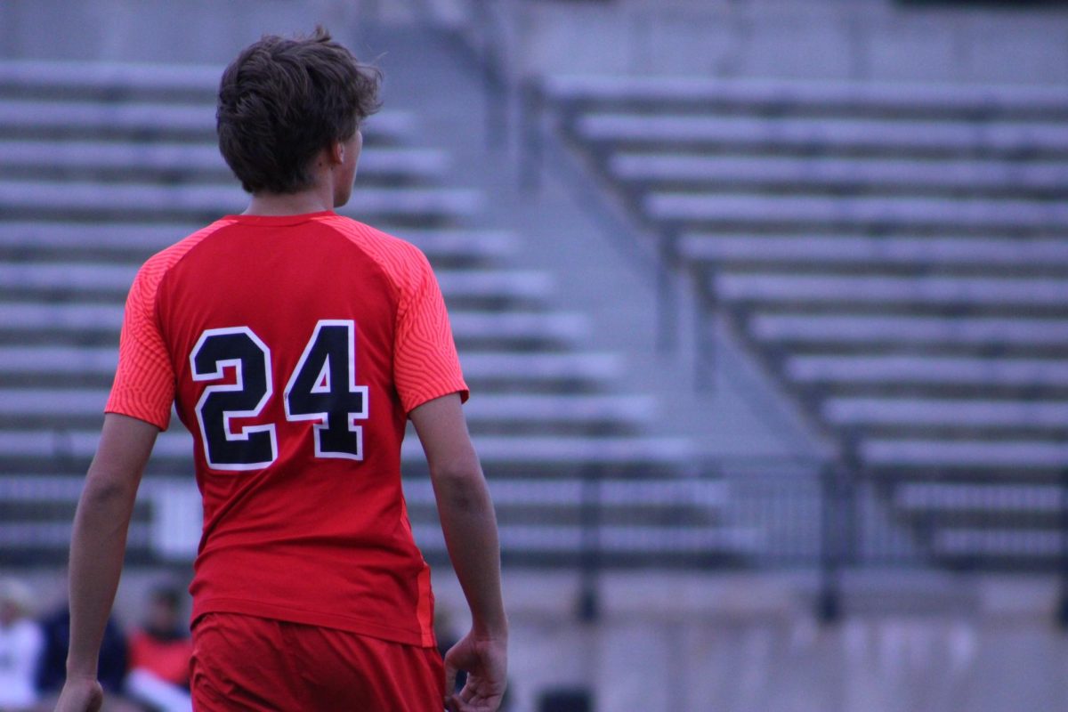 Senior Gus Zillman watching his teammates during the match.