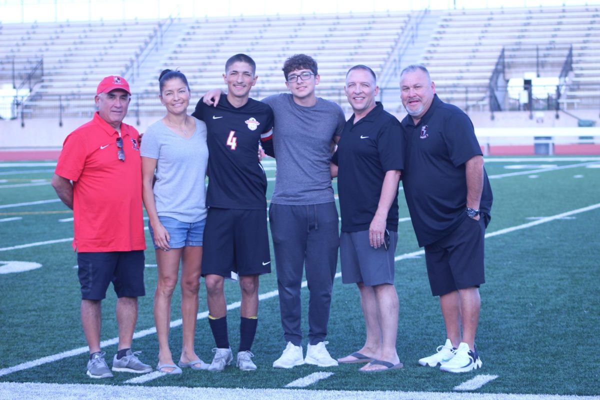 Senior captain Roman Yoder and his family spend the night celebrating all that he has achieved over his past 4 years of high school soccer.