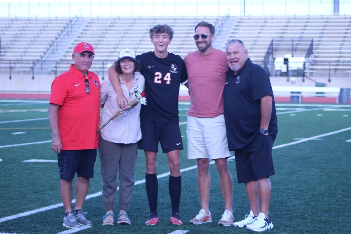 Senior Gus Zilliman's parents support their son at varsity soccer's senior night.