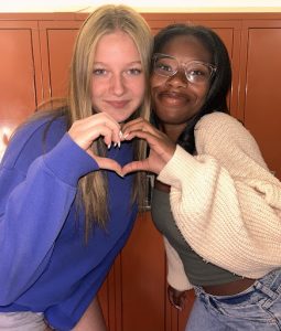 Sophomore Faryn Williams (left) and junior Moriah Pontiflet (right) represent their affection for the movie It Ends With Us.