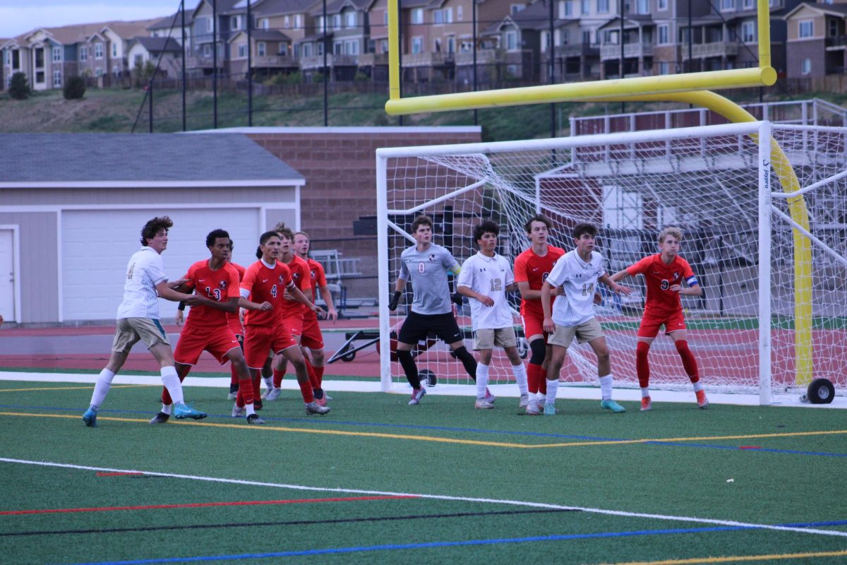 Eaglecrest preparing for the corner kick from Mullen.