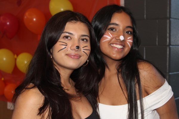 Seniors Mariya Adhikari and Ash Bhattarai, best friends, got their faces painted to match as cats!