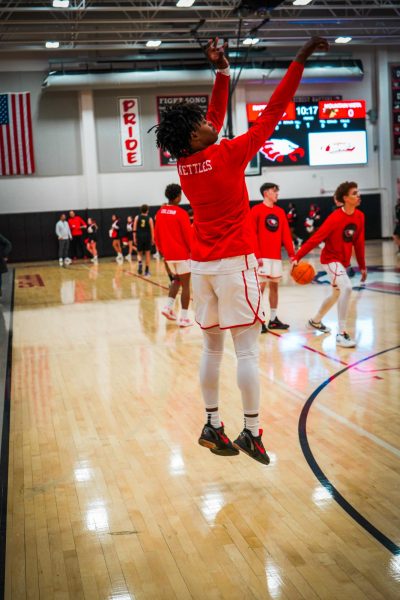 Senior Ant Nettles warming up for the game against Mountain Vista.