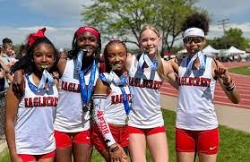 The 4 by 100m winners from left to right (Malanya Gaines, Zenobia Witt, Anaya Ewing, Tatum Gratix and Jaylynn Wilson) .