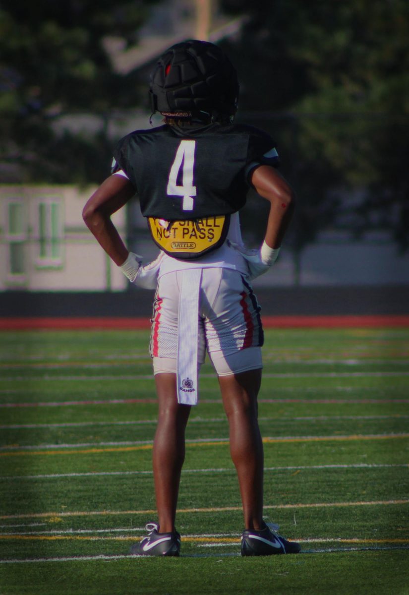 Junior Defensive Back Cy White just made a scrimmage saving tackle.  