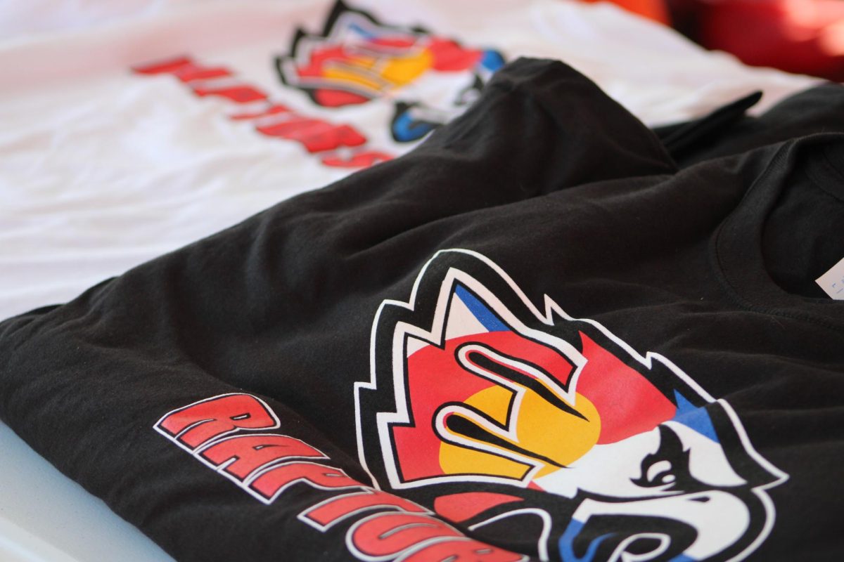 The Cheerleading Team sold a plethora of CO Raptor Head t-shirts!