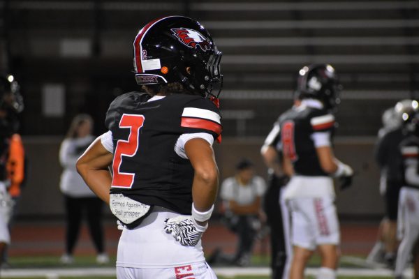 Senior Adriel Richardson looking to his coaches on the sidelines. 
