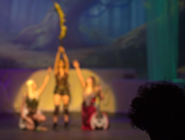 The lighting is a big part of the show, highlighting certain characters at specific moments, while the techies are leading cues and sound effects. At this moment, Tilly is explaining that the Eastern Blade of the Dreamwalker gives her strength in moments unknown. Wielding it makes her confident and strengthens her identity.