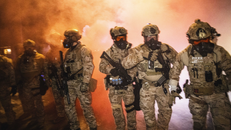 ICE agents fire tear gas, flash bangs, and pepper balls to suppress crowds of protestors in Minneapolis.