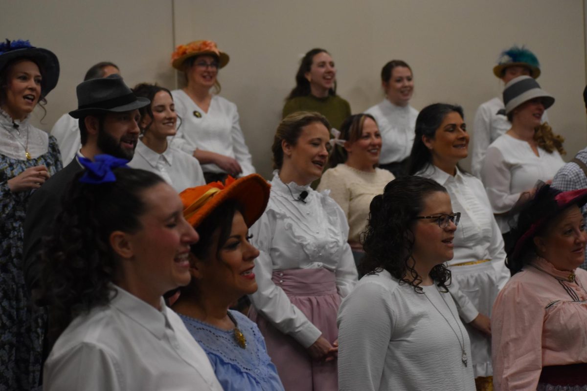The staff practicing and warming-up for the following performance.